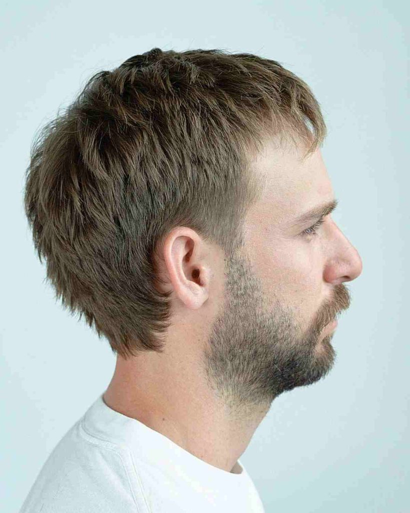 Low-Maintenance Shaggy Short Low Taper Fade