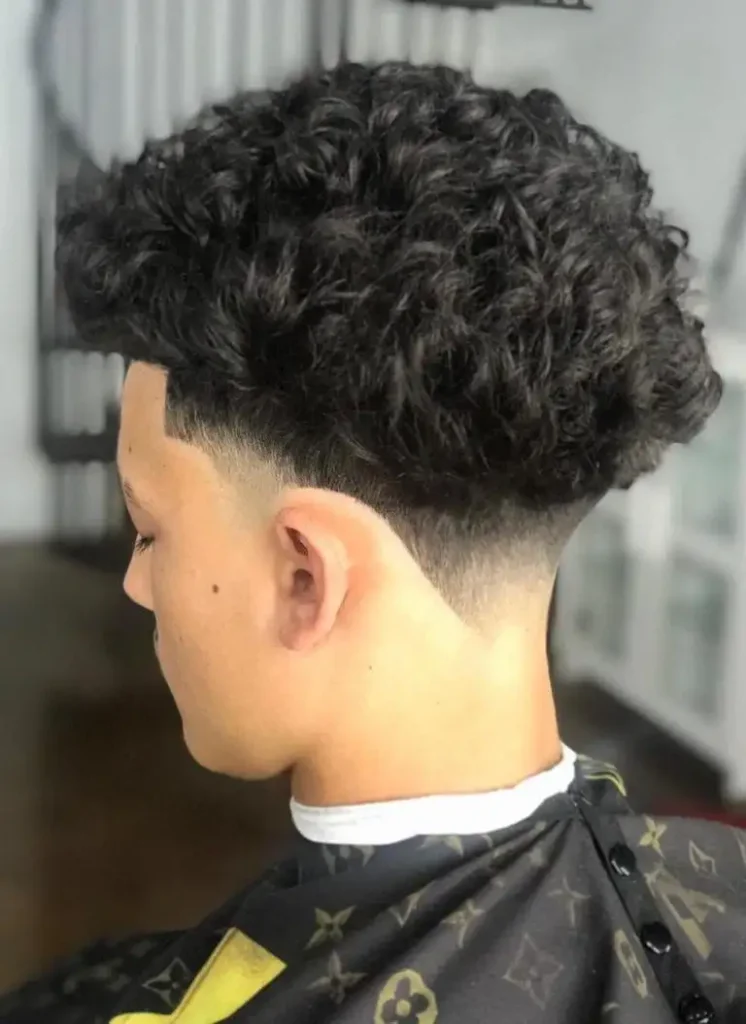 Curly Undercut Blended with a Taper Fade