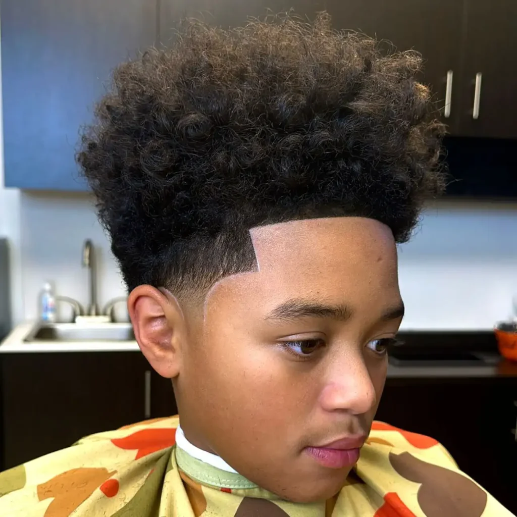 High Top Curls Paired with a Low Taper